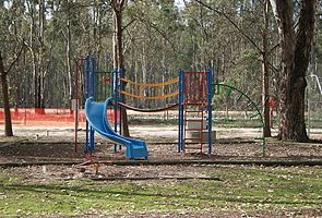 The kids can enjoy the playground, at Picnic Point Caravan Park